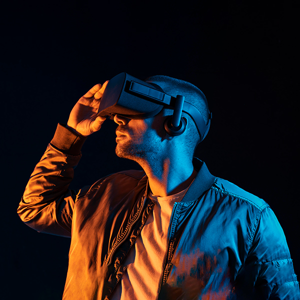 Man Wearing VR Headset Immersed in Virtual Reality - portfolio